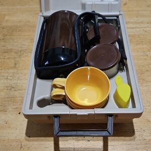 Portable Coffee Set with Brown Thermos and Yellow Cups